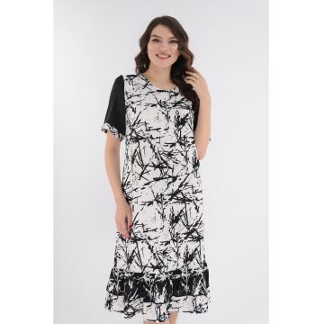 Rochie lejera alba cu print abstract si volanas la tiv