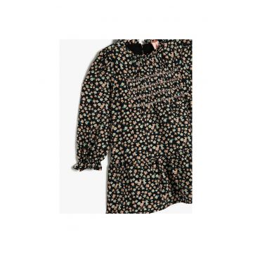 Rochie evazata cu model floral si volane
