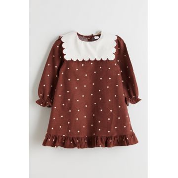 Rochie cu model cu buline si guler drapat