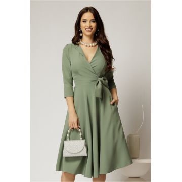 Rochie Dy Fashion verde fistic cu decolteu petrecut si funda maxi