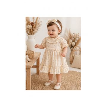 Rochita fetite crem din bumbac cu imprimeu floral si volane elegante